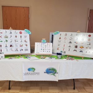 Display table with playground and pool communication signs from RLS