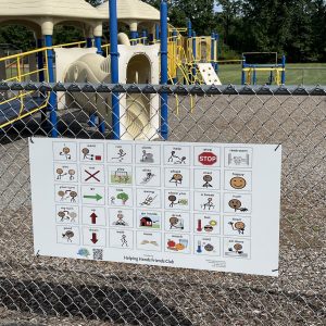 Communication Board mounted on chiain ink fence