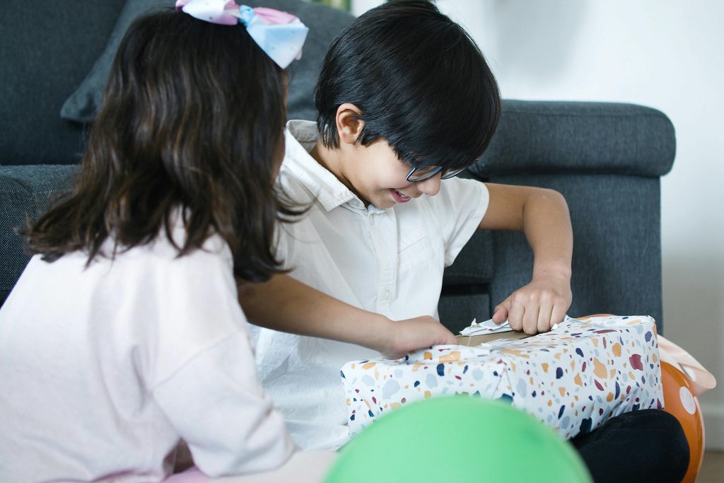 child opening gift